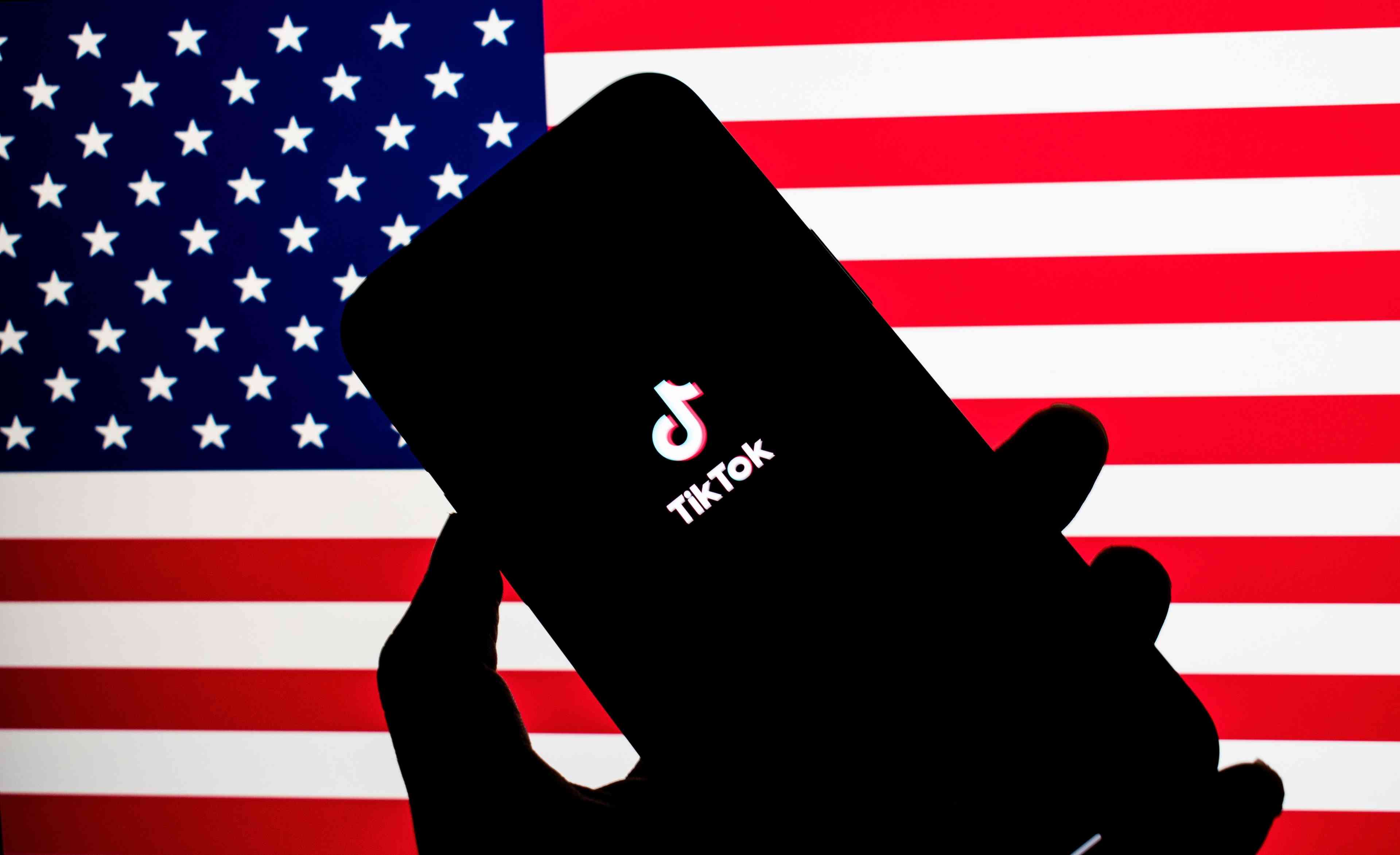 TikTok on the backdrop of the American Flag background