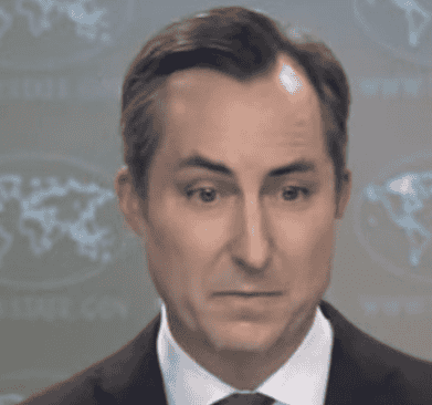 US State Department Spokesperson Matthew Miller. background