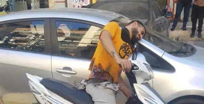 Hezbollah militant after the exploding pagers attack background