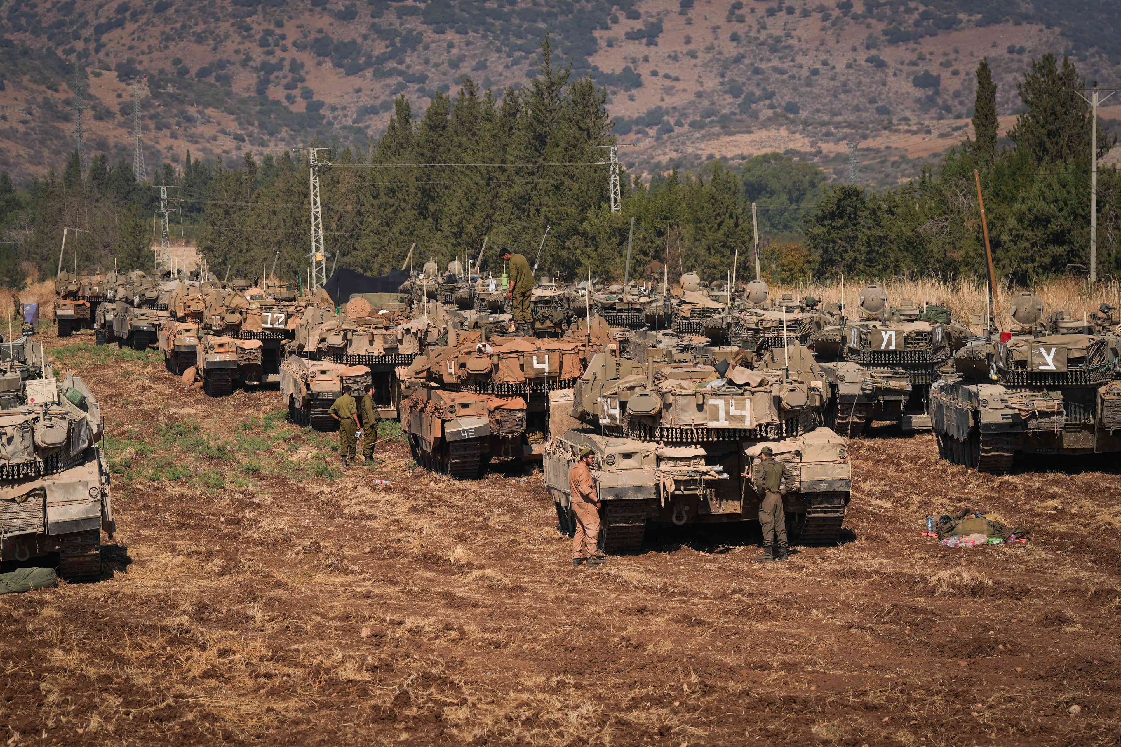 Israeli soldiers seen at a staging area near the Israeli border with Lebanon, September 27, 2024. background