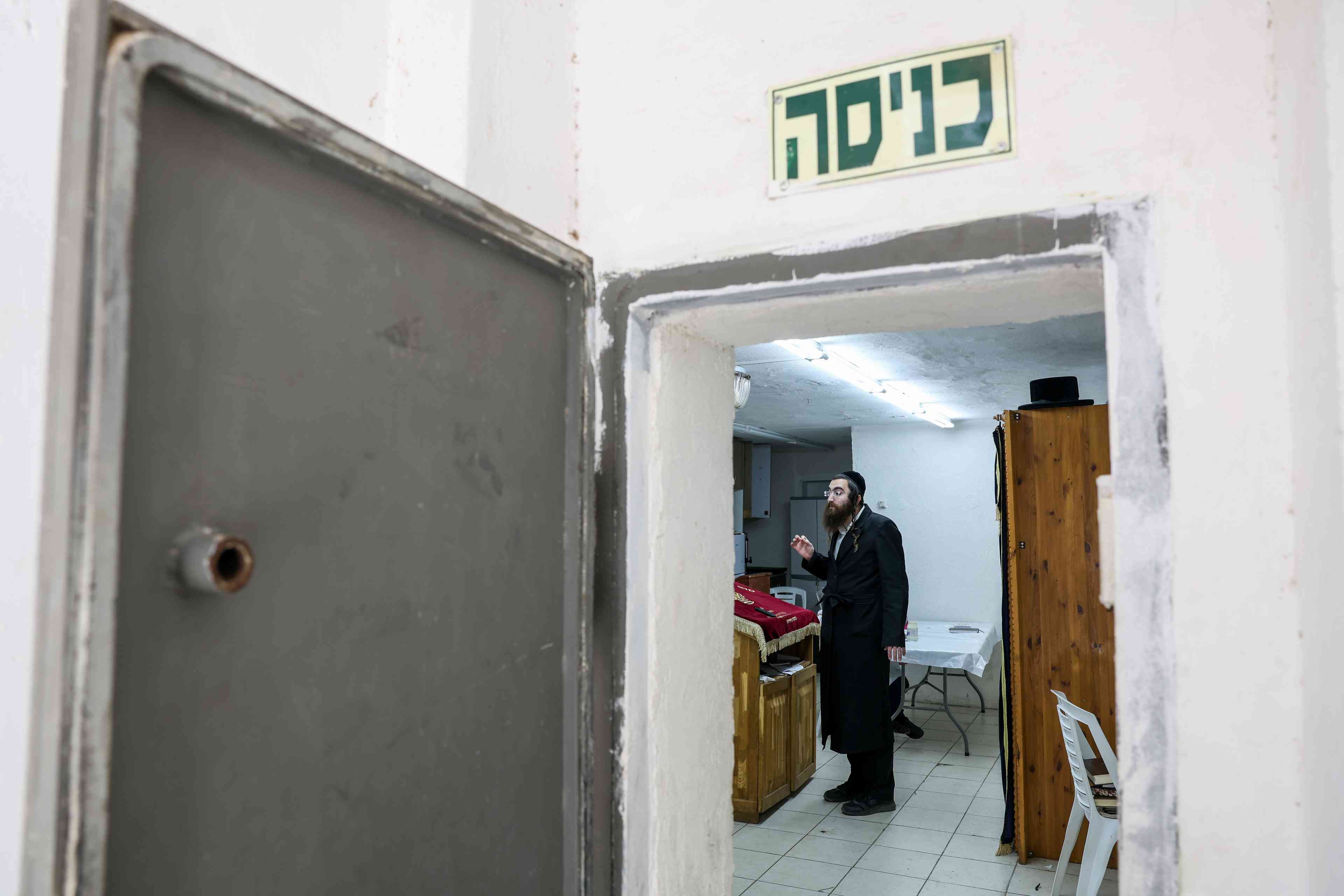 Ultra orthodox jewish kids study at a public bomb shelter in the northern Israeli town of Tzfat, September 29, 2024. background