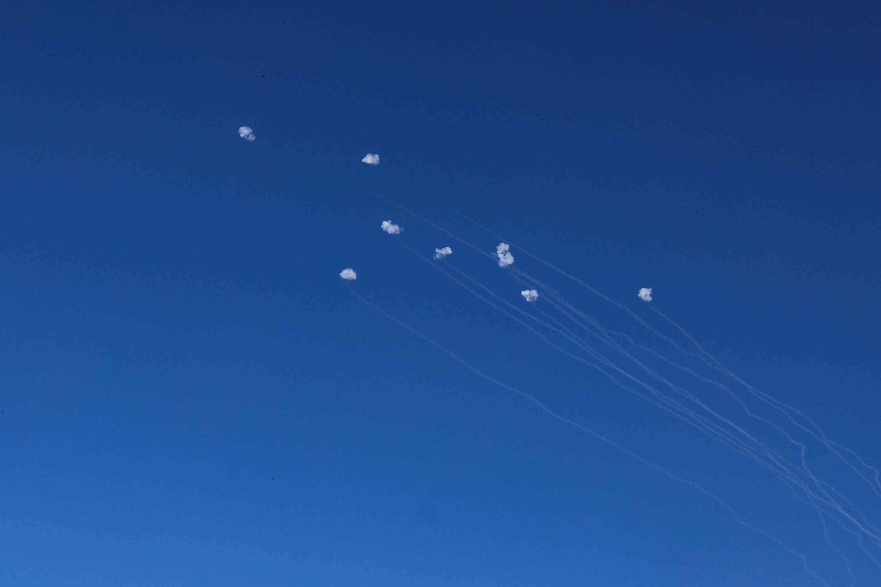 An Israeli anti missile system intercept missiles fired from Lebanon as it seen from Jish, on September 29, 2024. background