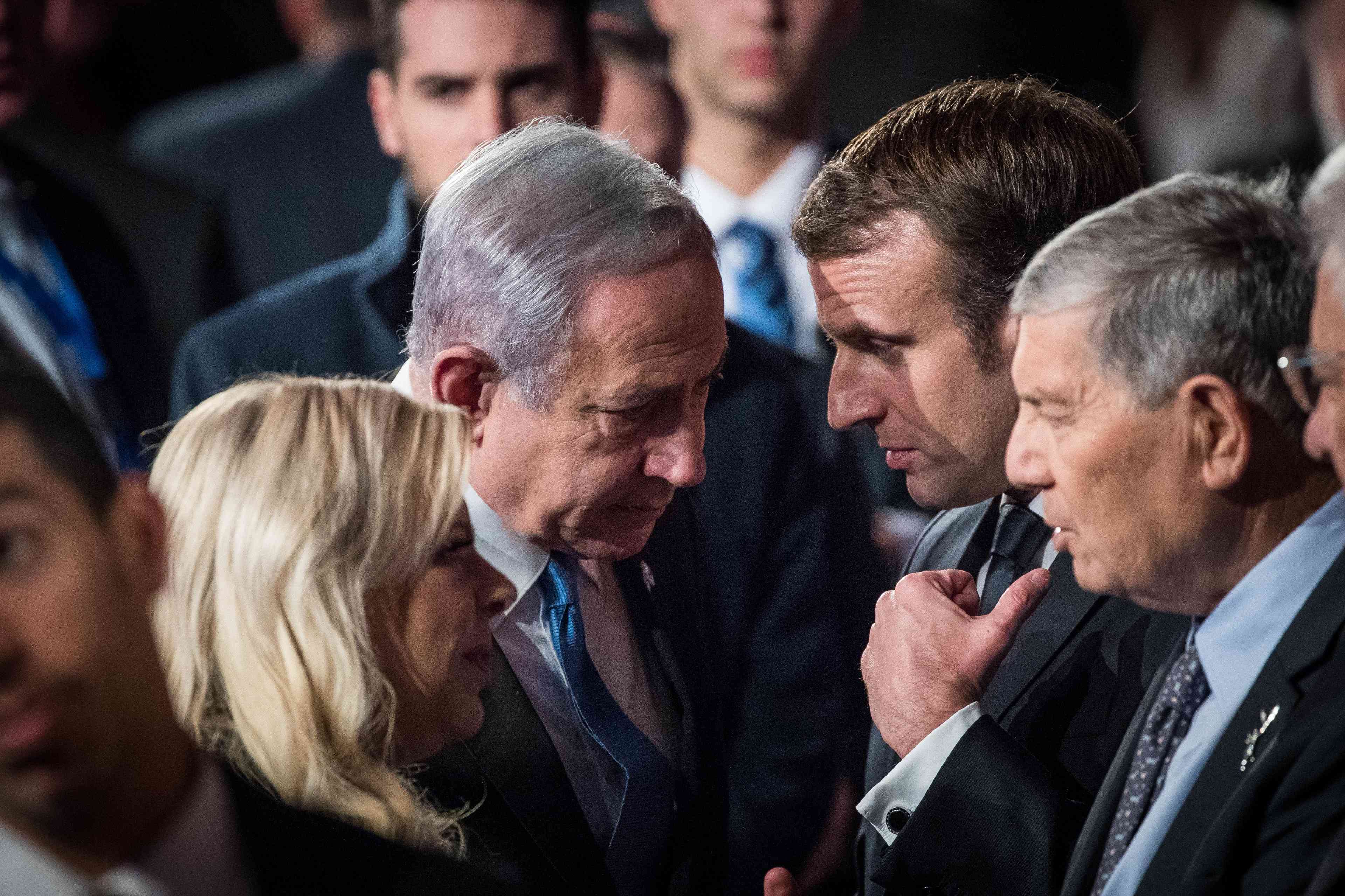 Macron and Netanyahu. background