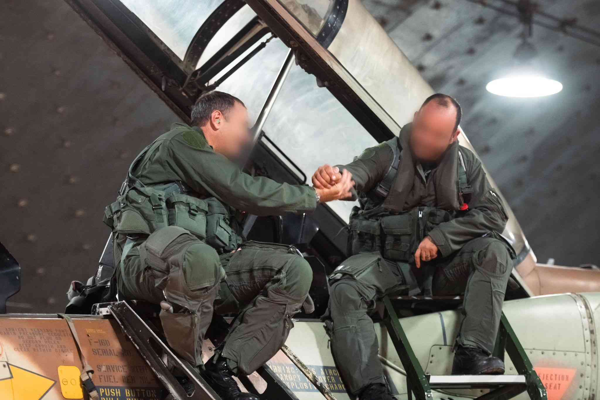 Wishing each other luck and success before the mission background