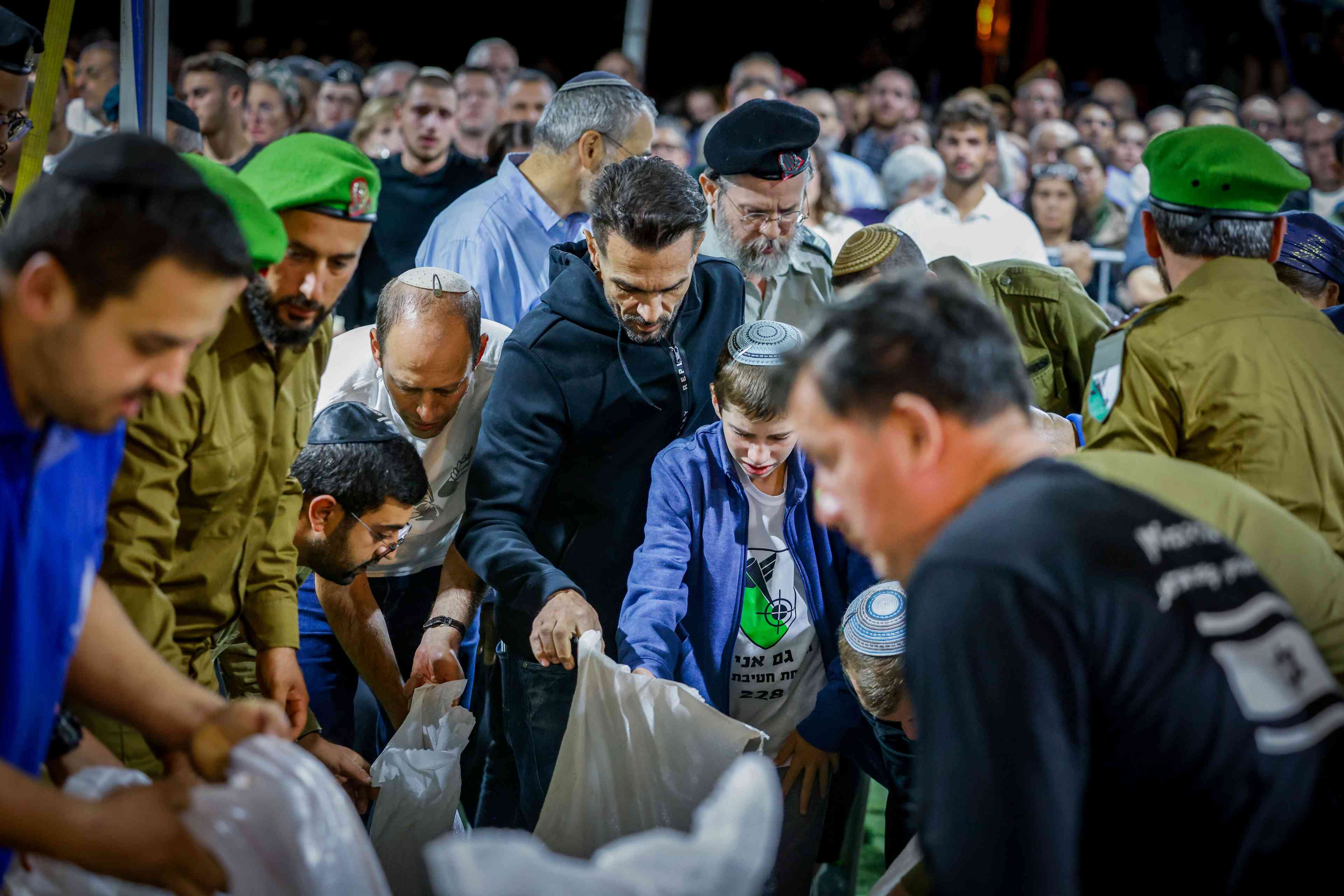 Funeral of Avraham Yosef Goldberg HY'D background