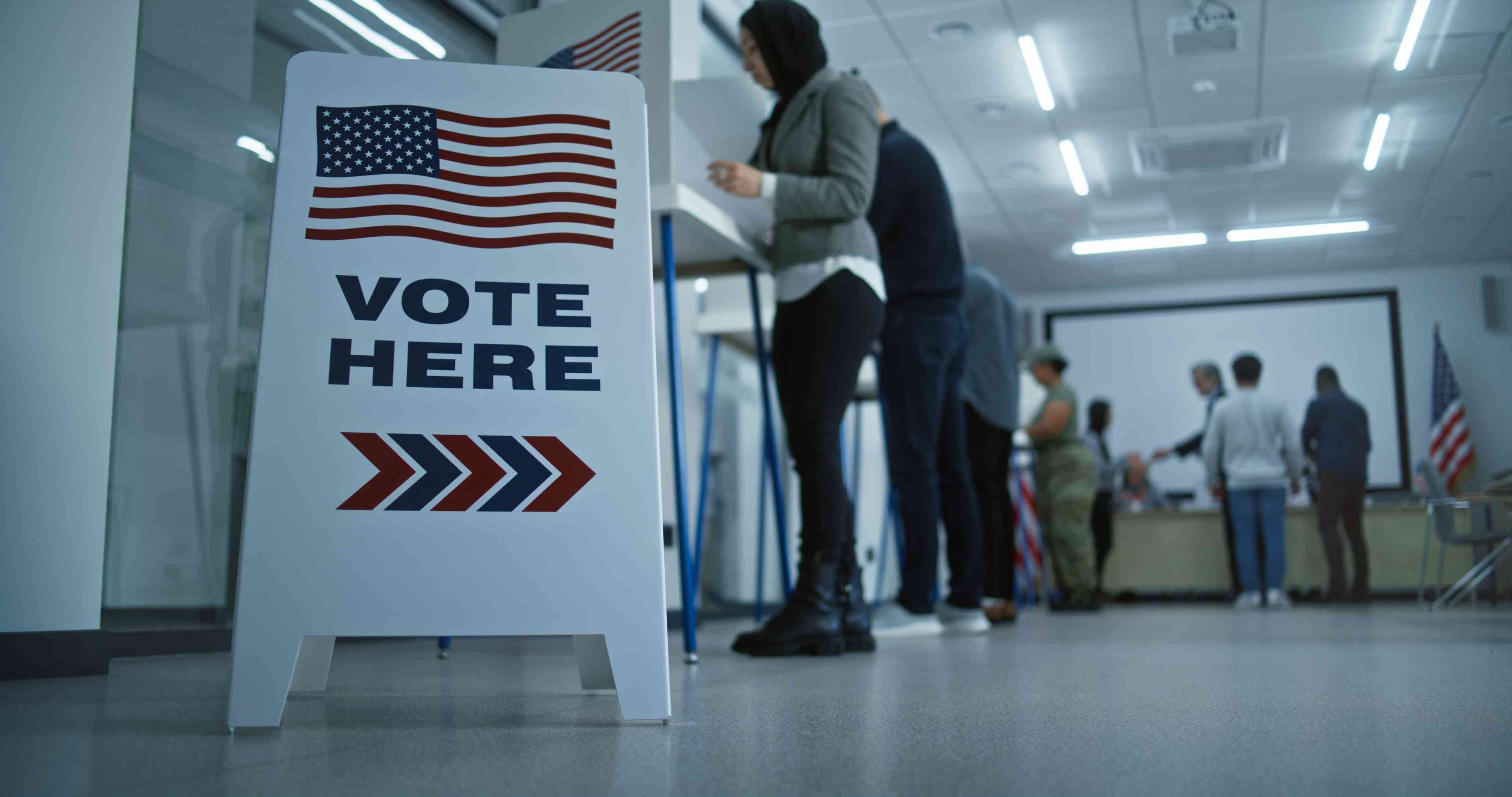 Vote here sign background