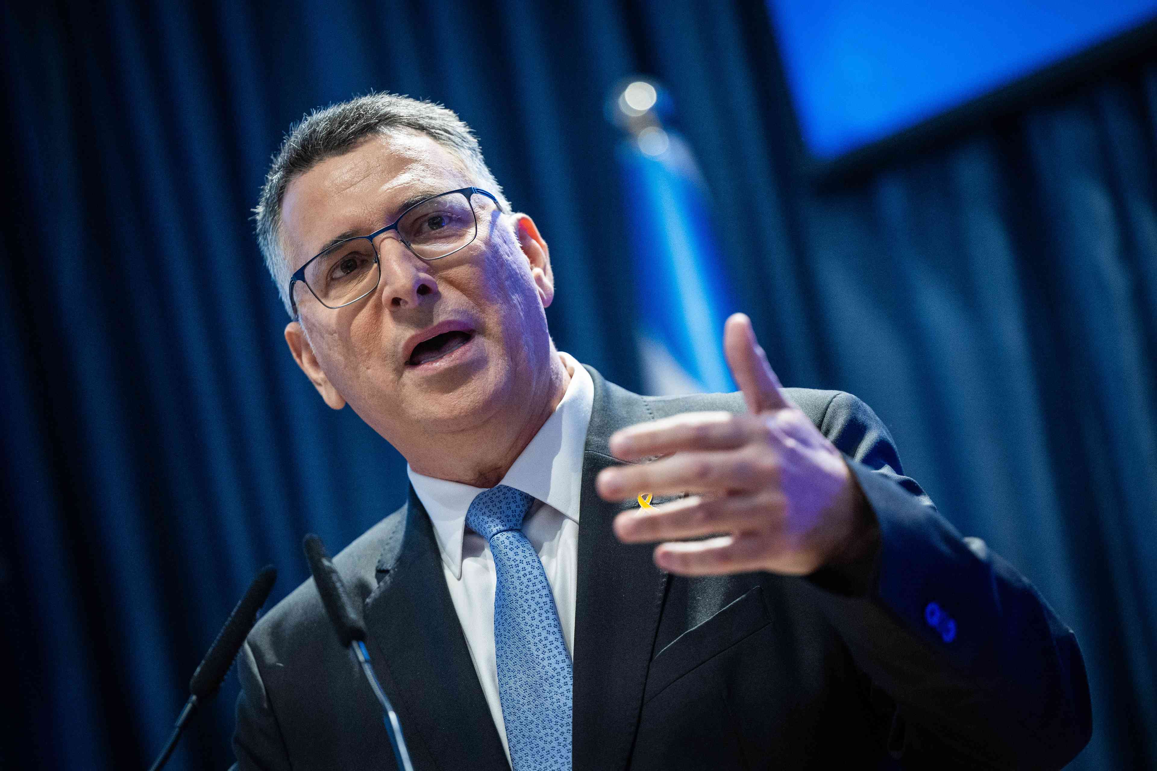 Foreign Minister Gideon Saar. background