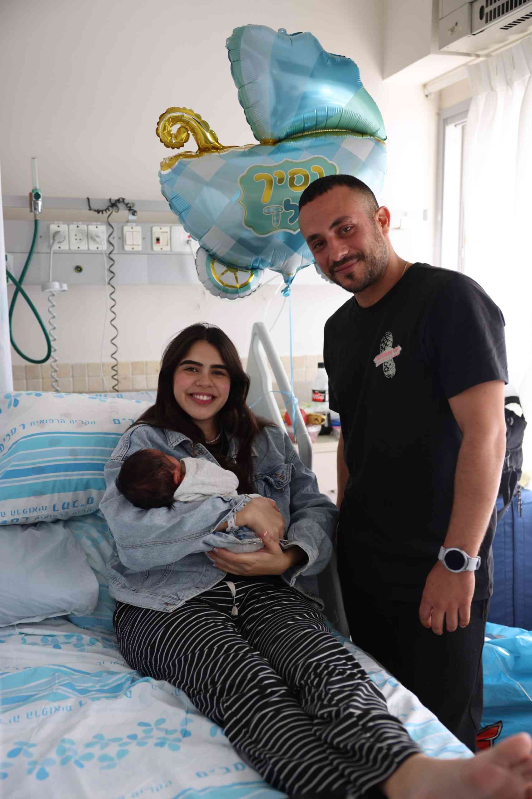 Dor and Zohar Avidan and newborn baby boy background