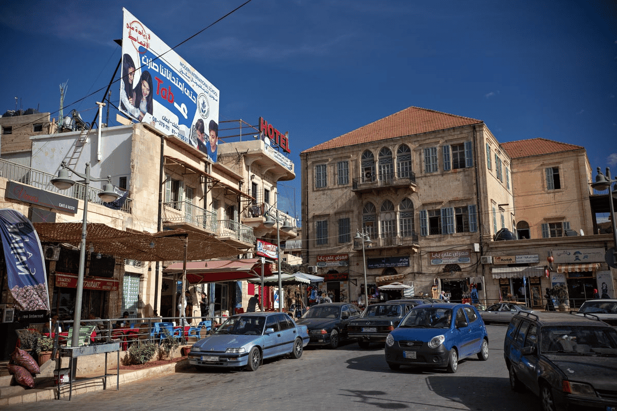 An old square in modern Baalbek background
