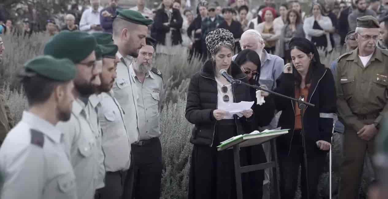 Funeral of Ze'ev Erlich background