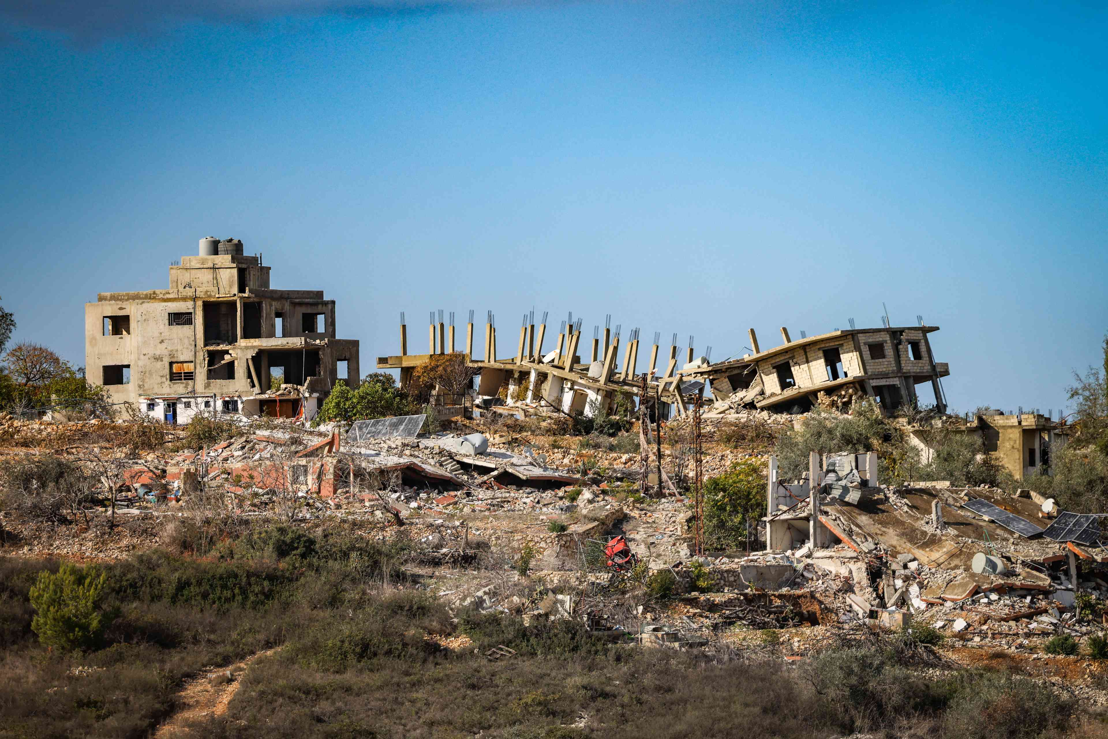Destroyed buildings in a village in southern Lebanon, on November 20, 2024, during Israeli military operations in southern Lebanon background