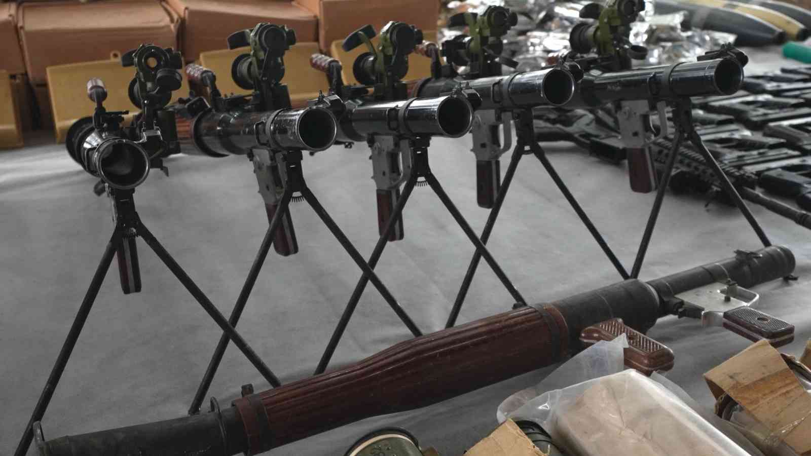 Huge weapons cache bound for the West Bank background