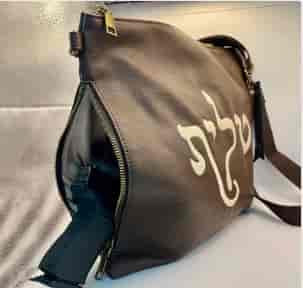 Tallis bag which doubles as a concealed carry weapons bag background