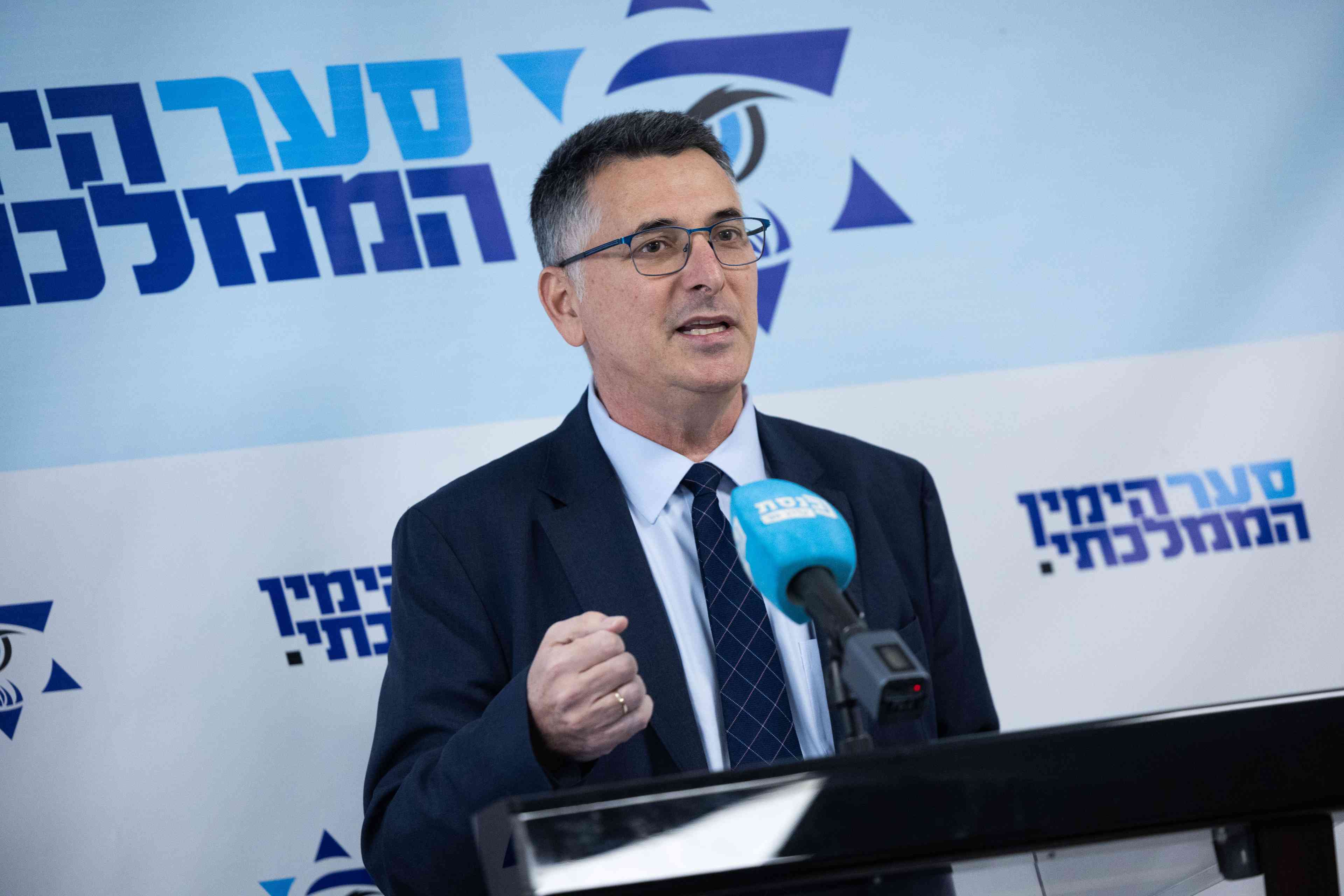 Foreign Minister Gideon Saar. background