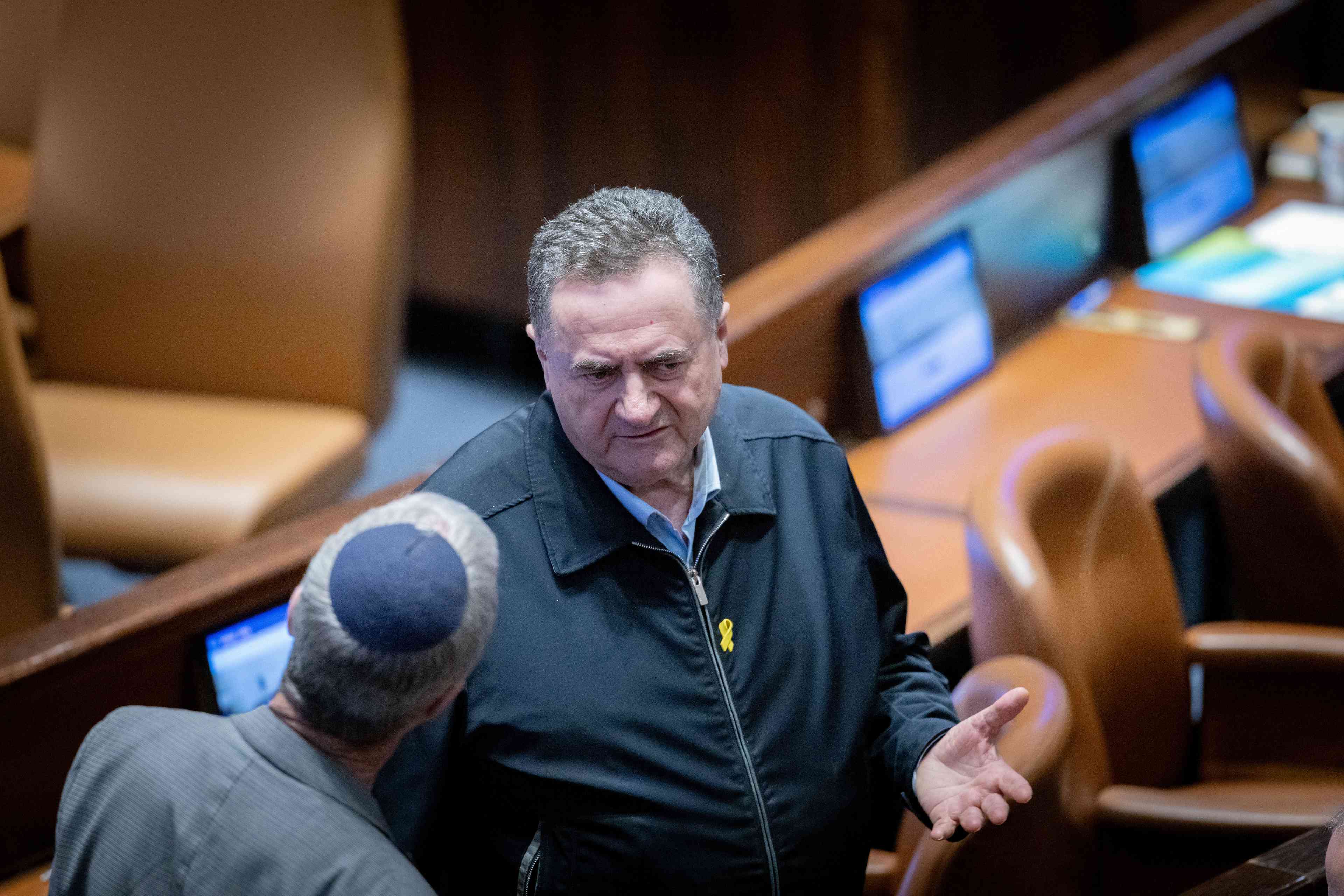 Defense Minister Katz. background