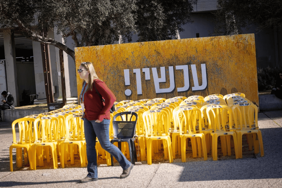 "Now!" Protest for the hostages.  background
