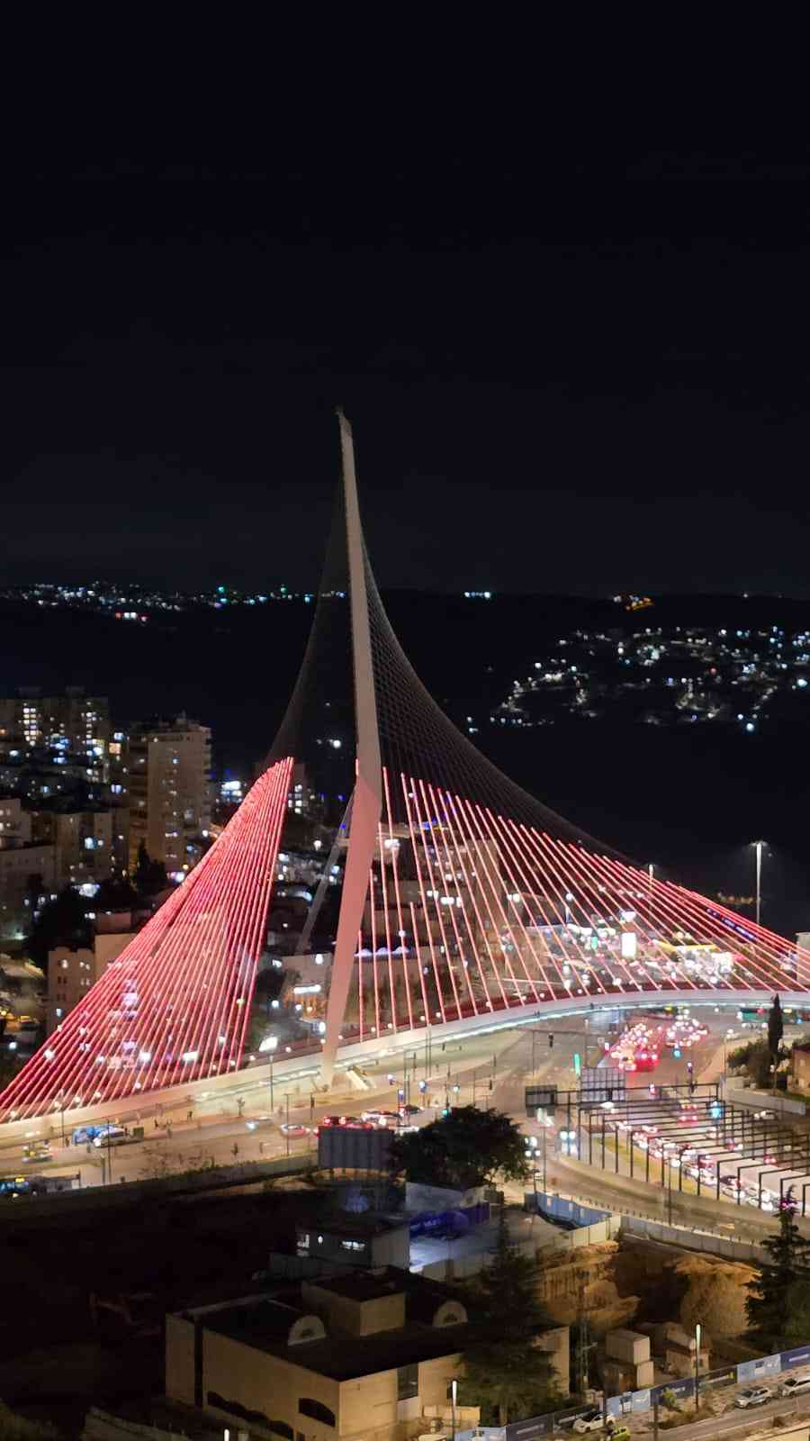 Lighting up the Chords Bridge for the Bibas family. background