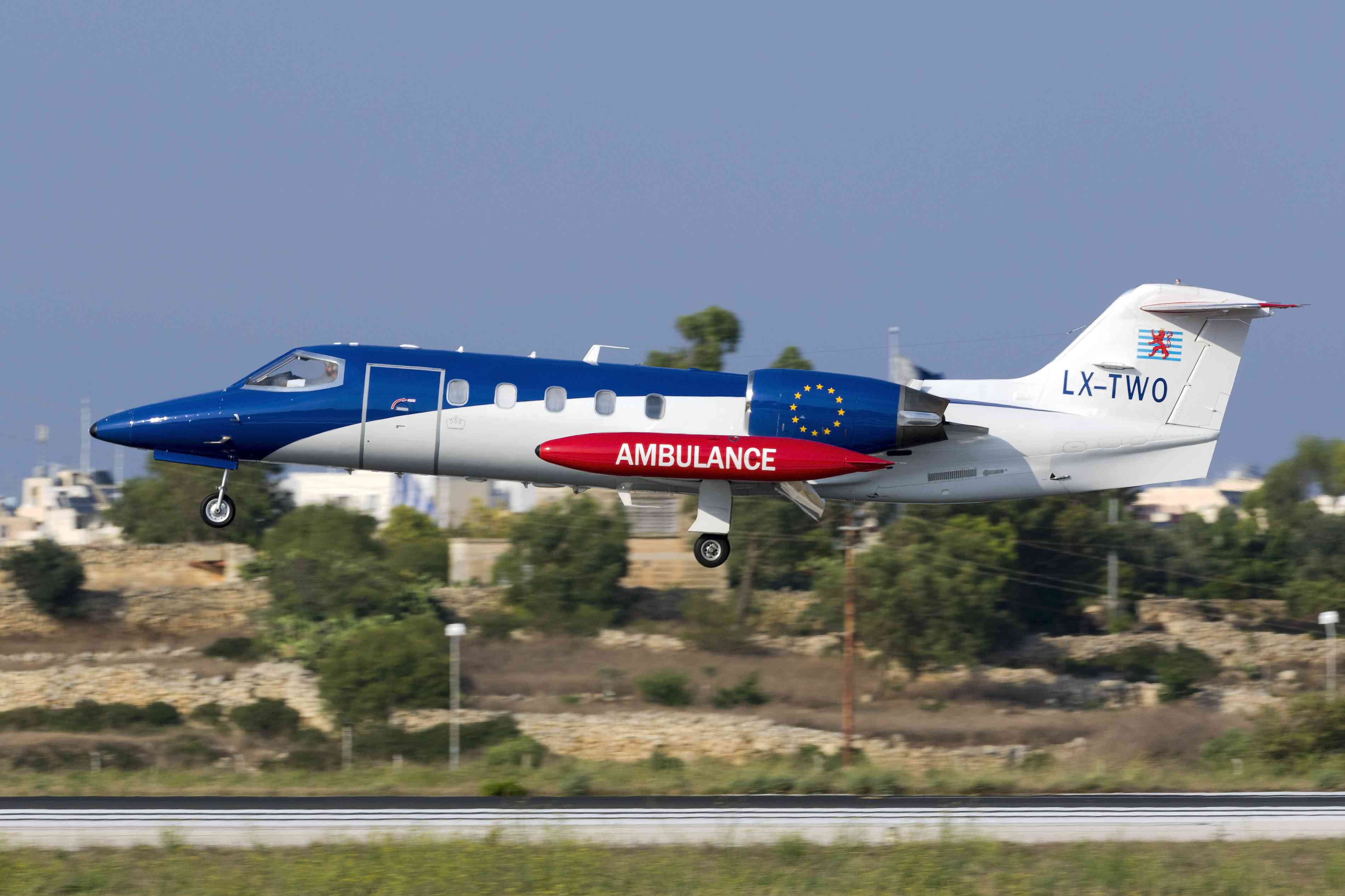 Luxembourg Air Ambulance Learjet 35A/ZR on finals for runway 31 background