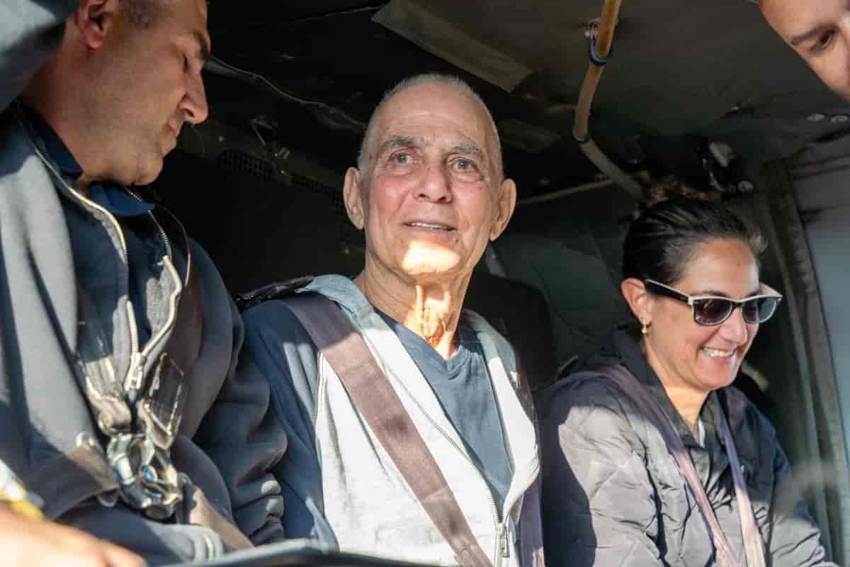 Gadi Mozes on his way to hospital following his release background
