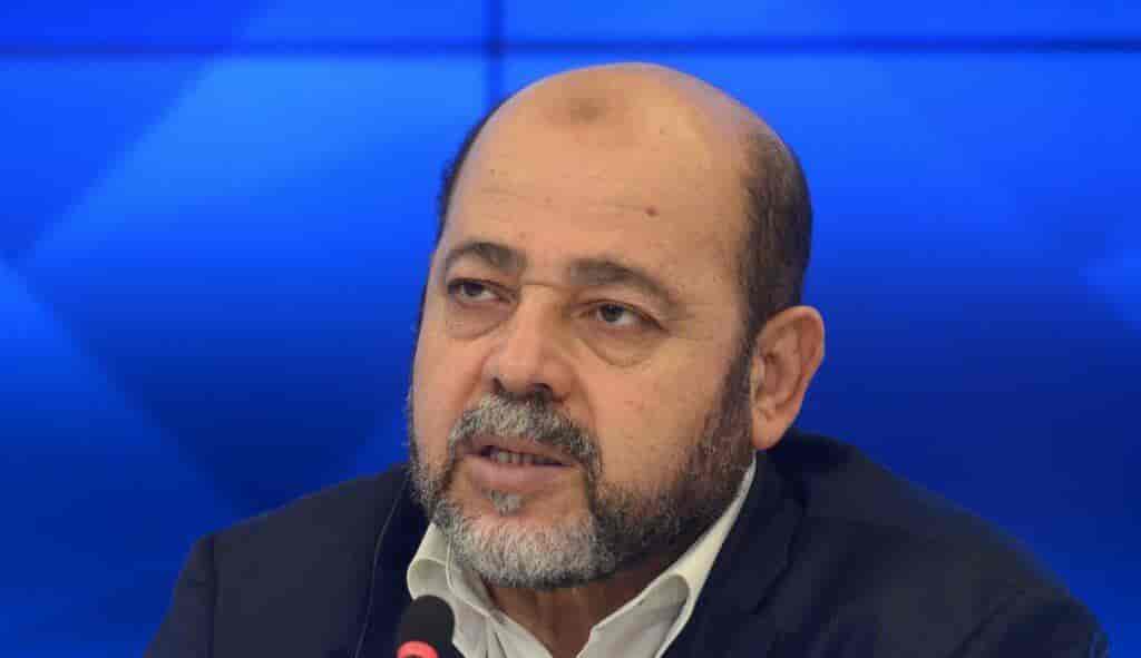 Hamas senior leader Mousa Abu Marzook. background