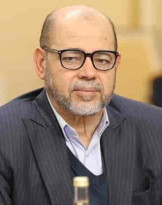 Hamas senior leader Mousa Abu Marzook. background