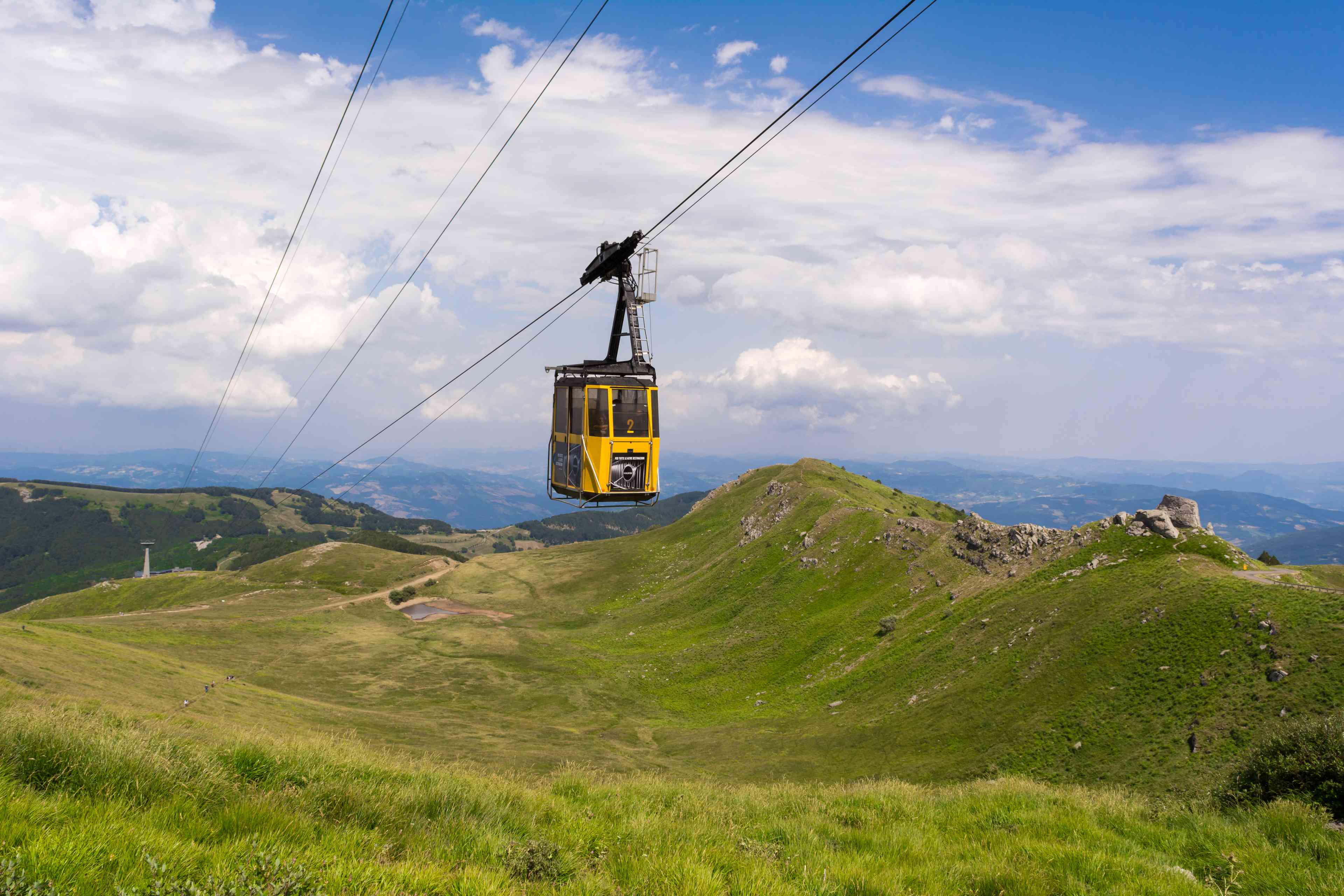 Cable car in Monte Cimone Italy background