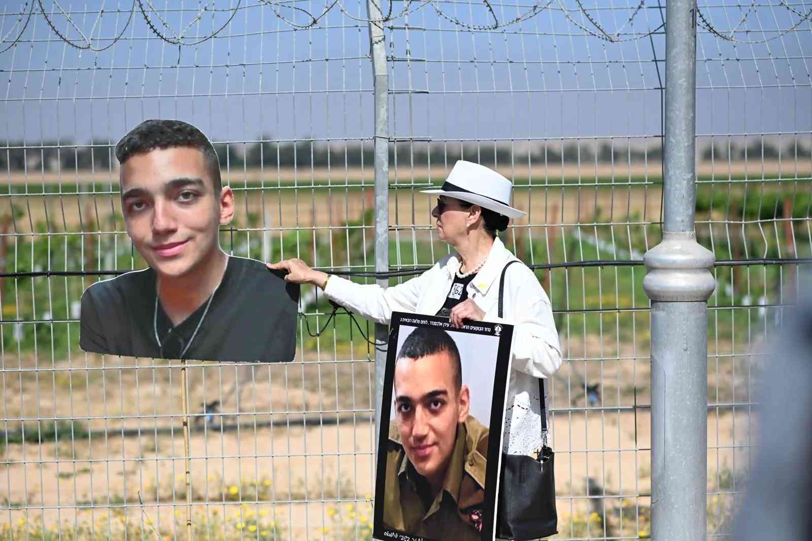 Families of the hostages at the Gaza border background