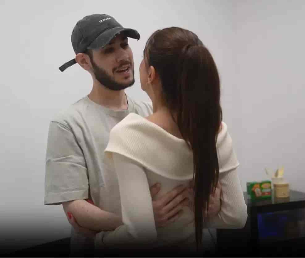 Eliya Cohen with his partner Ziv Abud following his release background