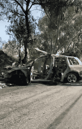 Car that was attacked in Sidon background