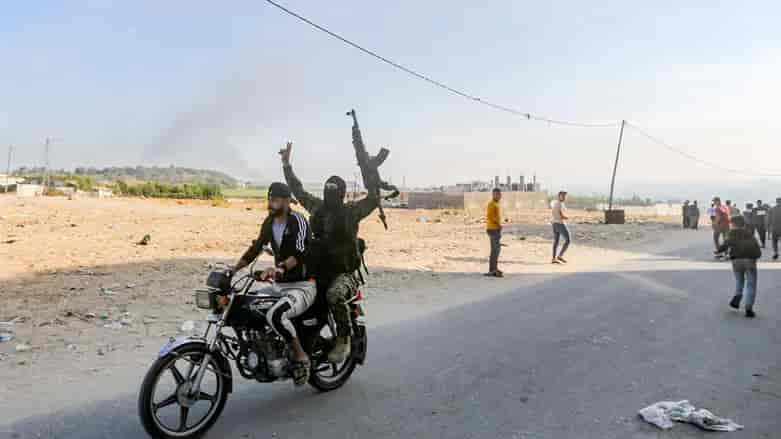 Terrorists infiltrating on October 7th background
