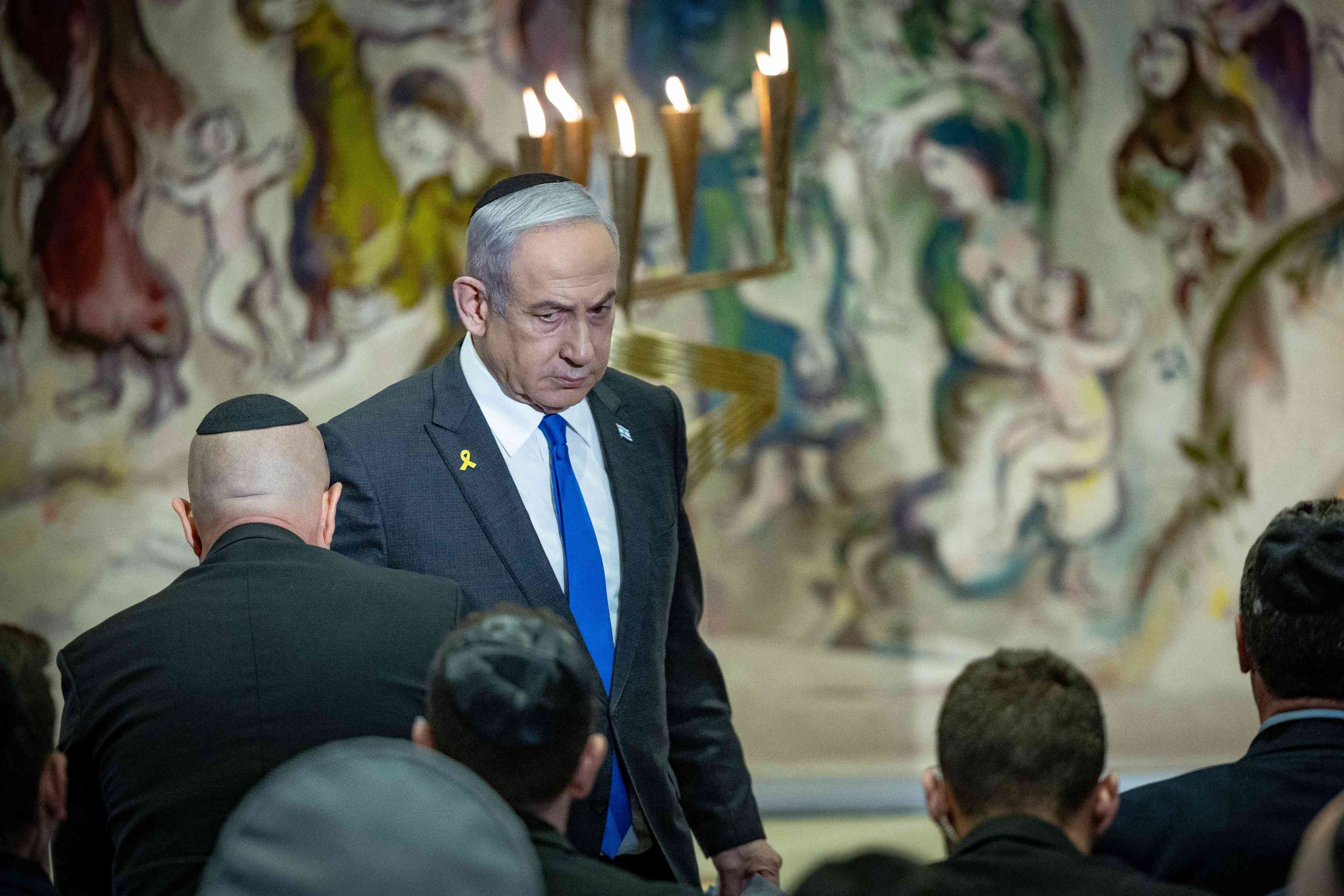 Prime Minister Benjamin Netanyahu attends a Holocaust memorial day ceremony background