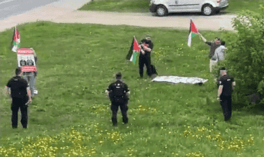 Protesting Israel in front of the death camp. background