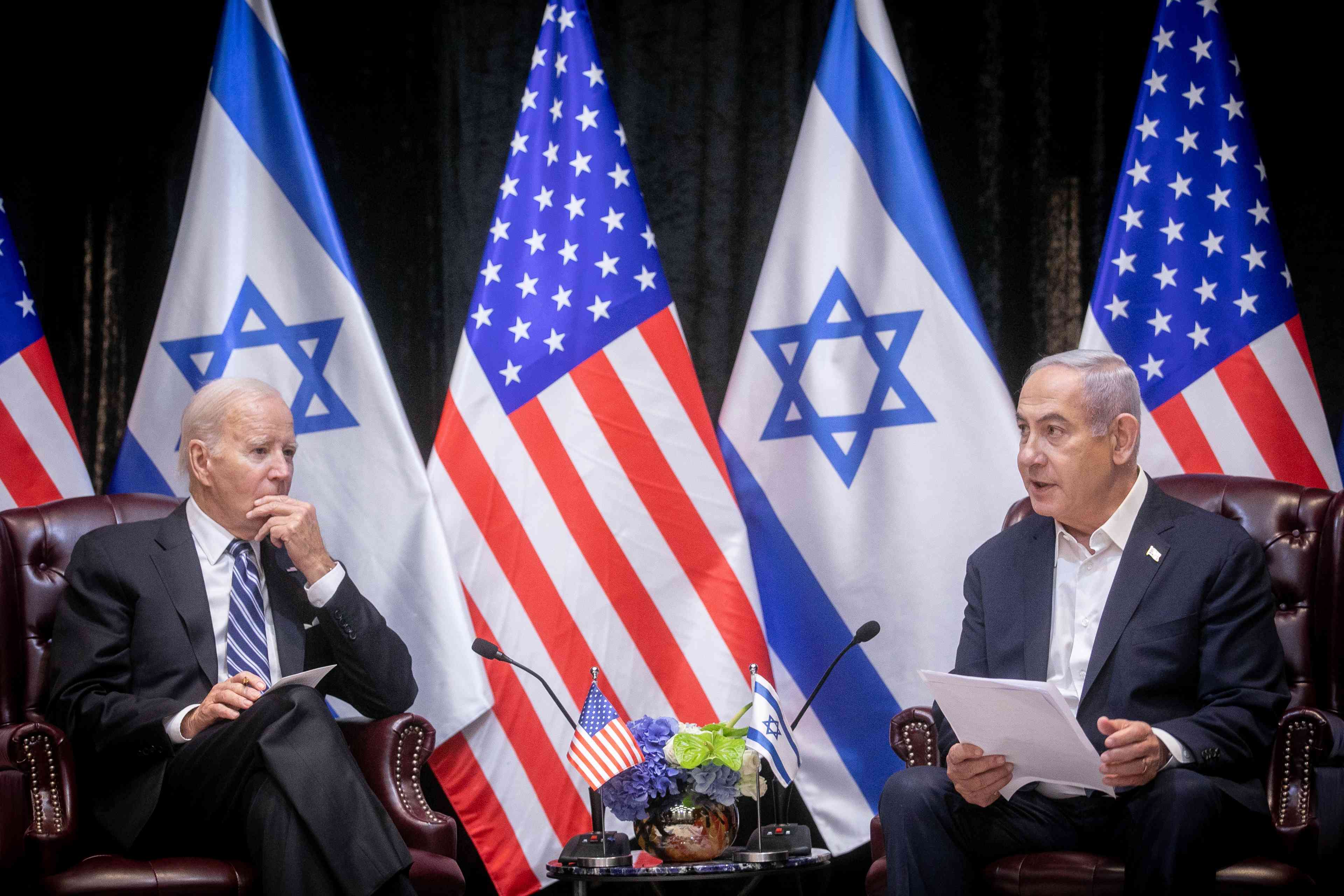 Friendly talks, with antagonism simmering. Netanyahu and Biden. background