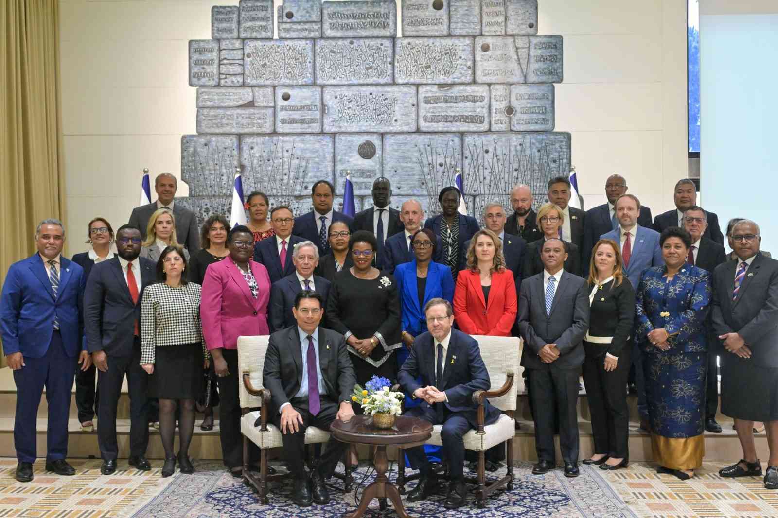 Herzog and the UN Ambassadors' delegation. background