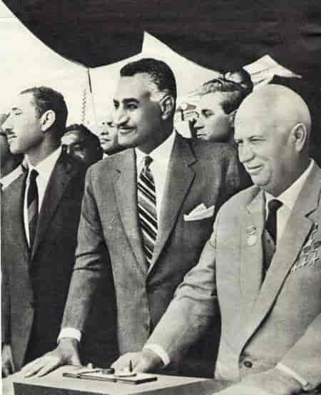 Gamal Abdel Nasser, in the middle background