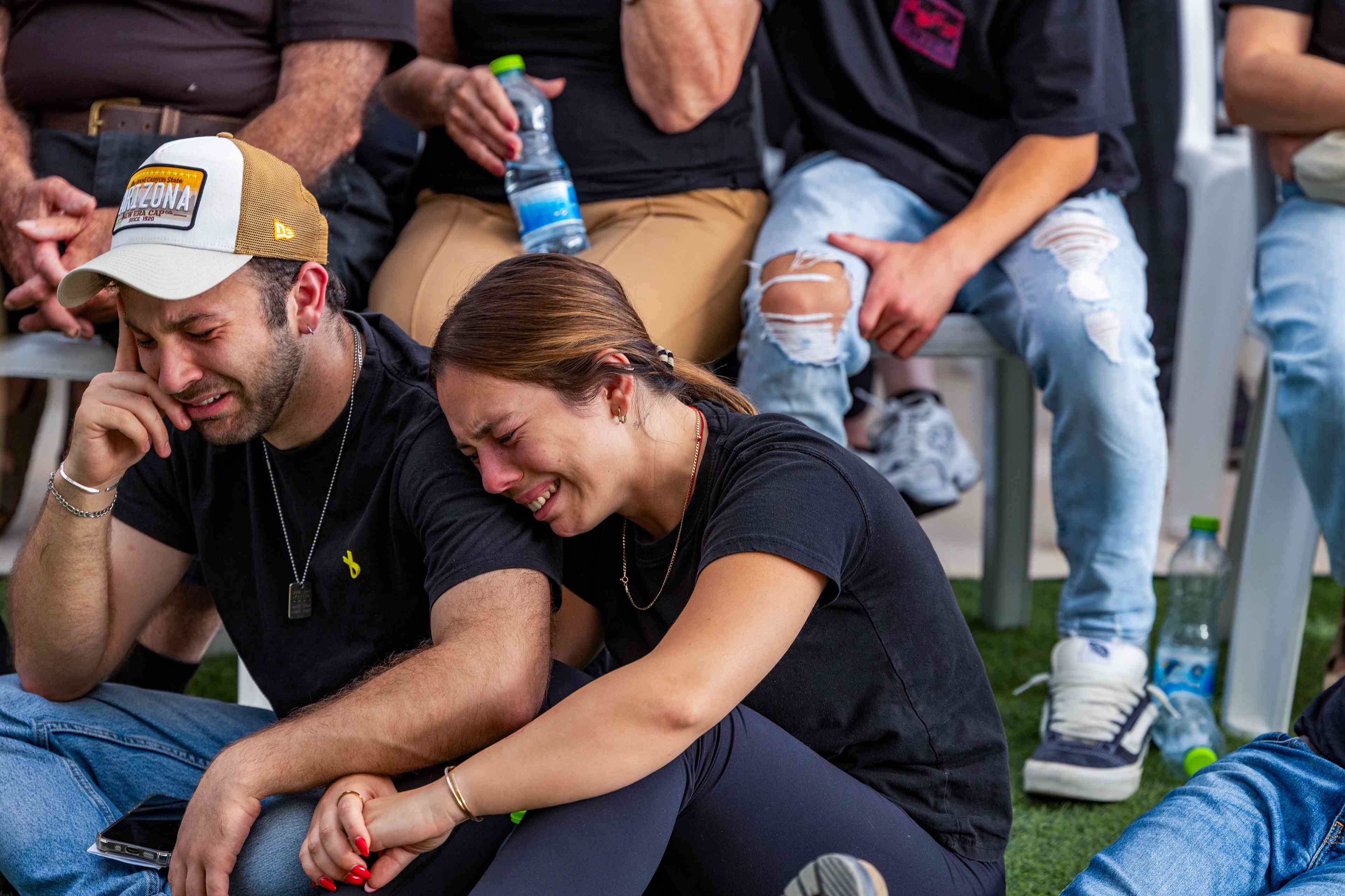 Family and friends of Israeli soldier Master sergeant (res.) Asaf Cafri attend his funeral at the Gezer Regional Council on April 27, 2025. He was killed in combat in the Gaza Strip.  background