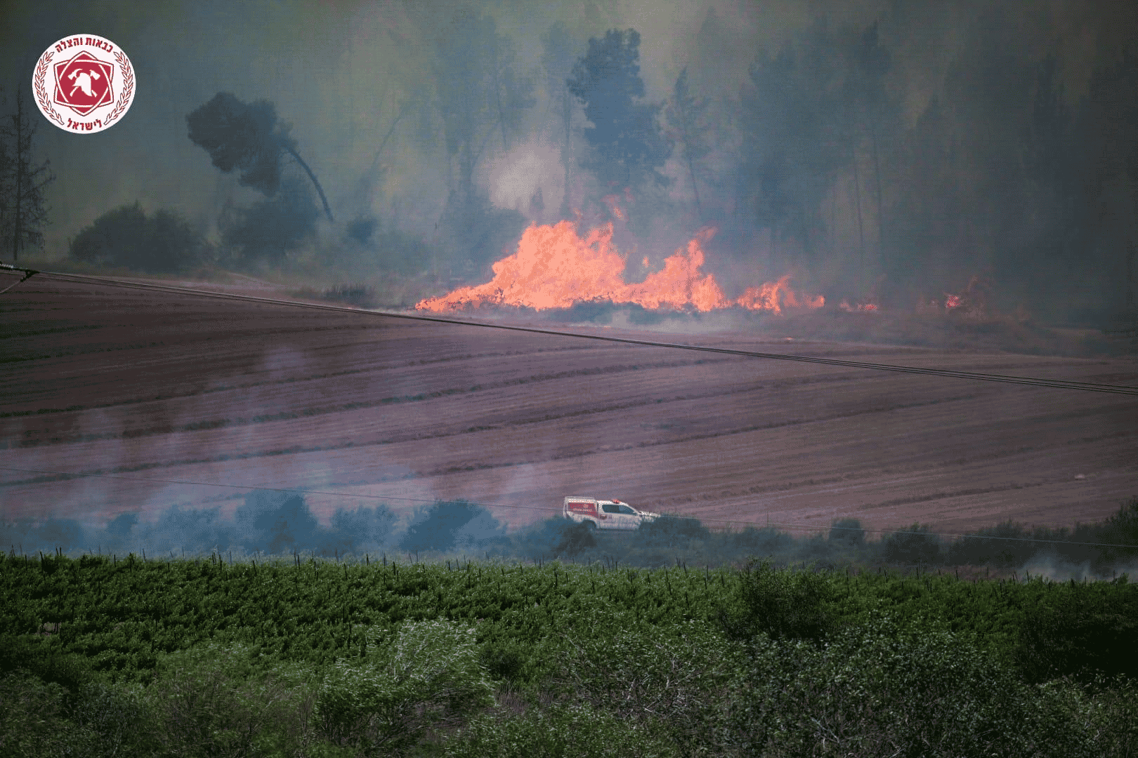 Fires burning out of control in Jerusalem hills background