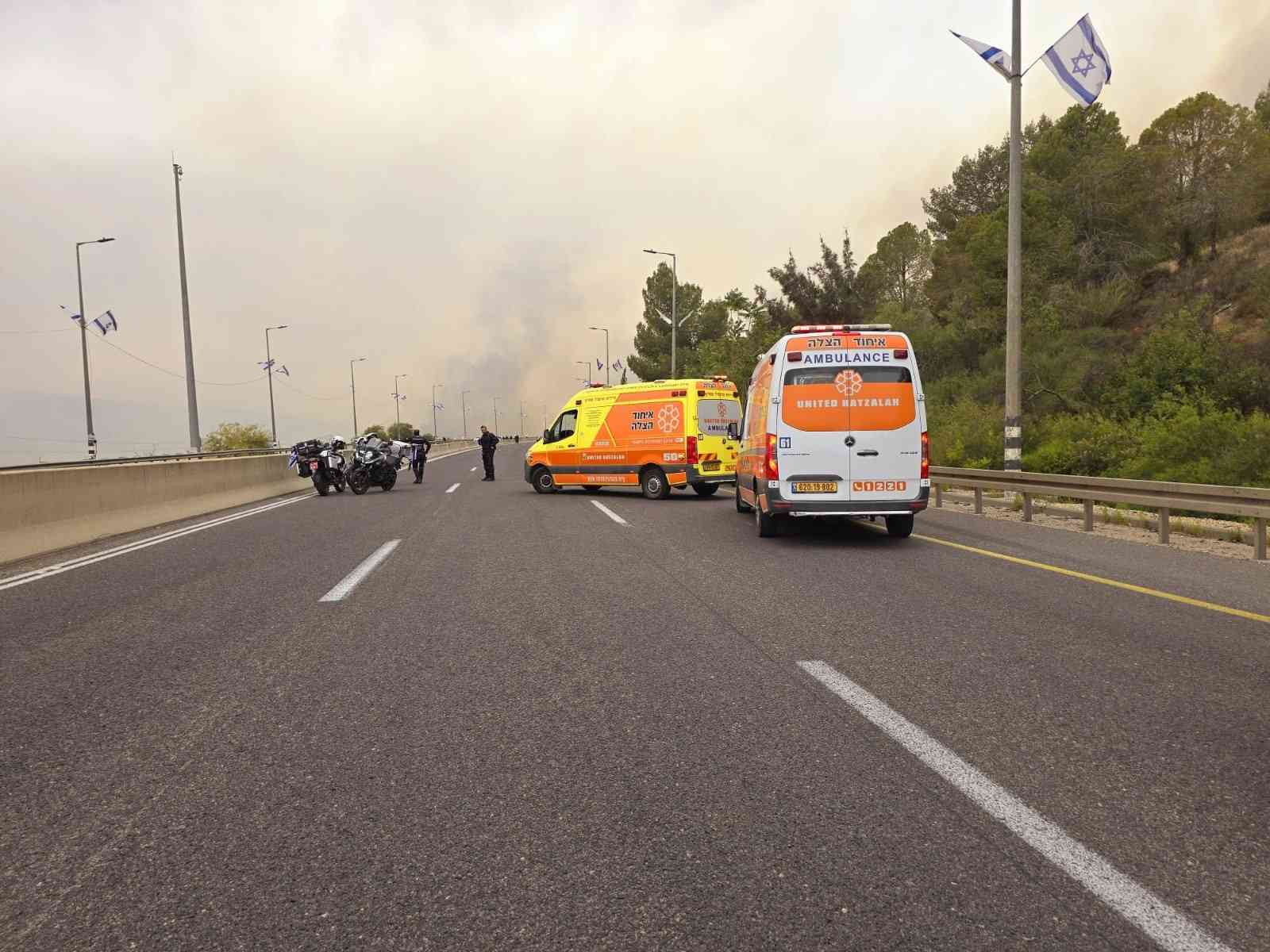 Road 1 closed as fire engulfs the area background