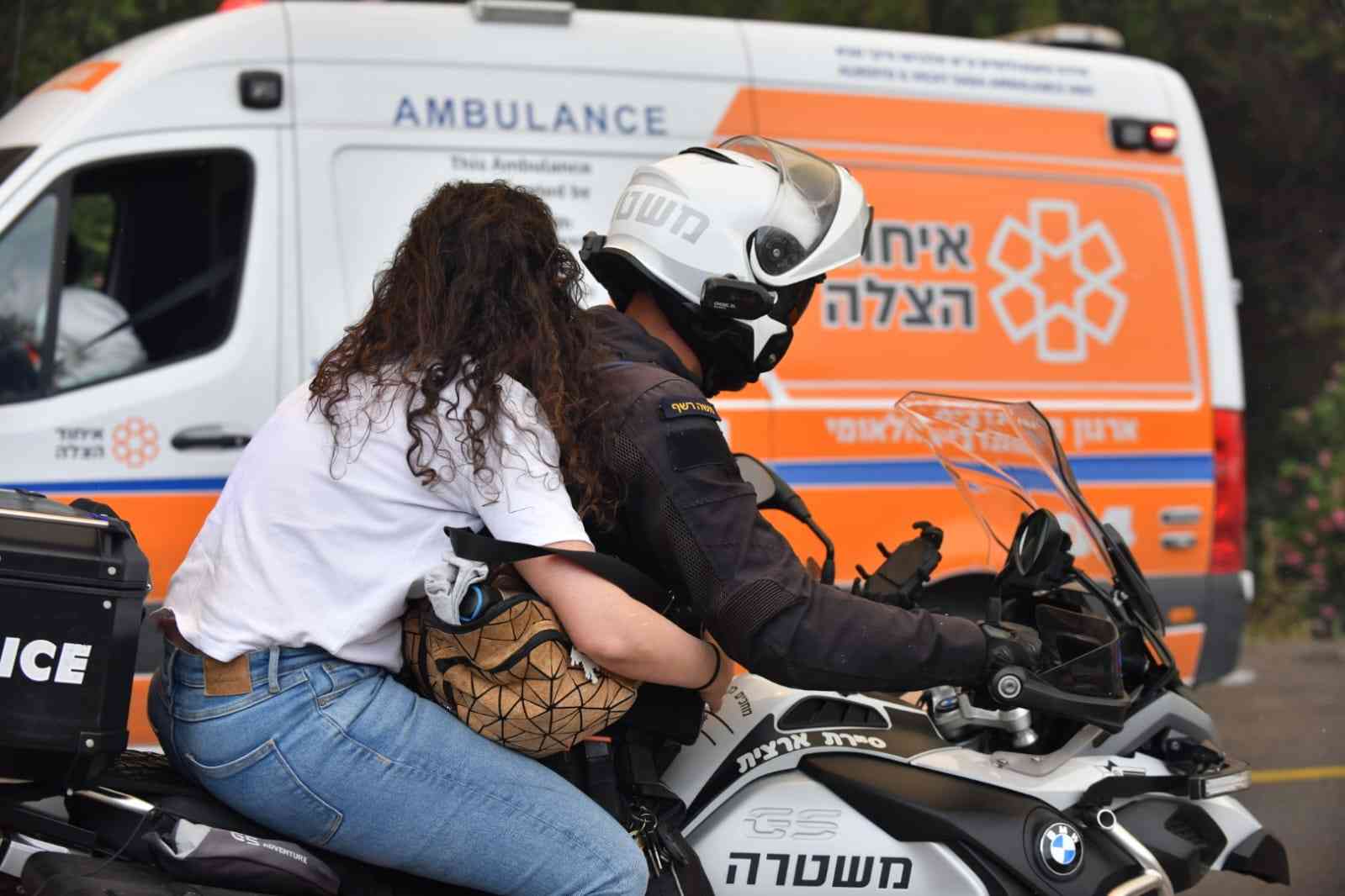 Police evacuating civilians from the fire background