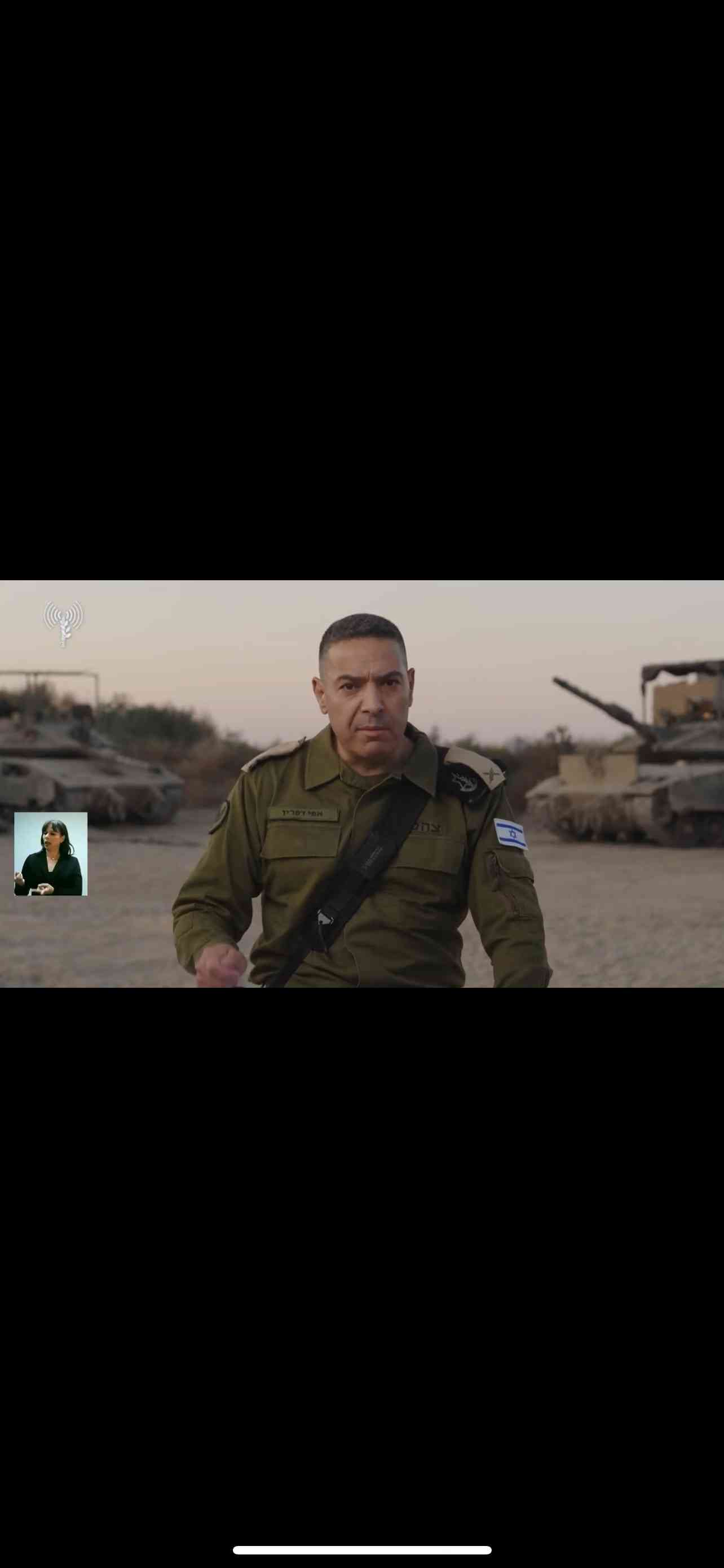 IDF Spokesperson Brigadier General Effie Defrin during the press statement from Gaza background