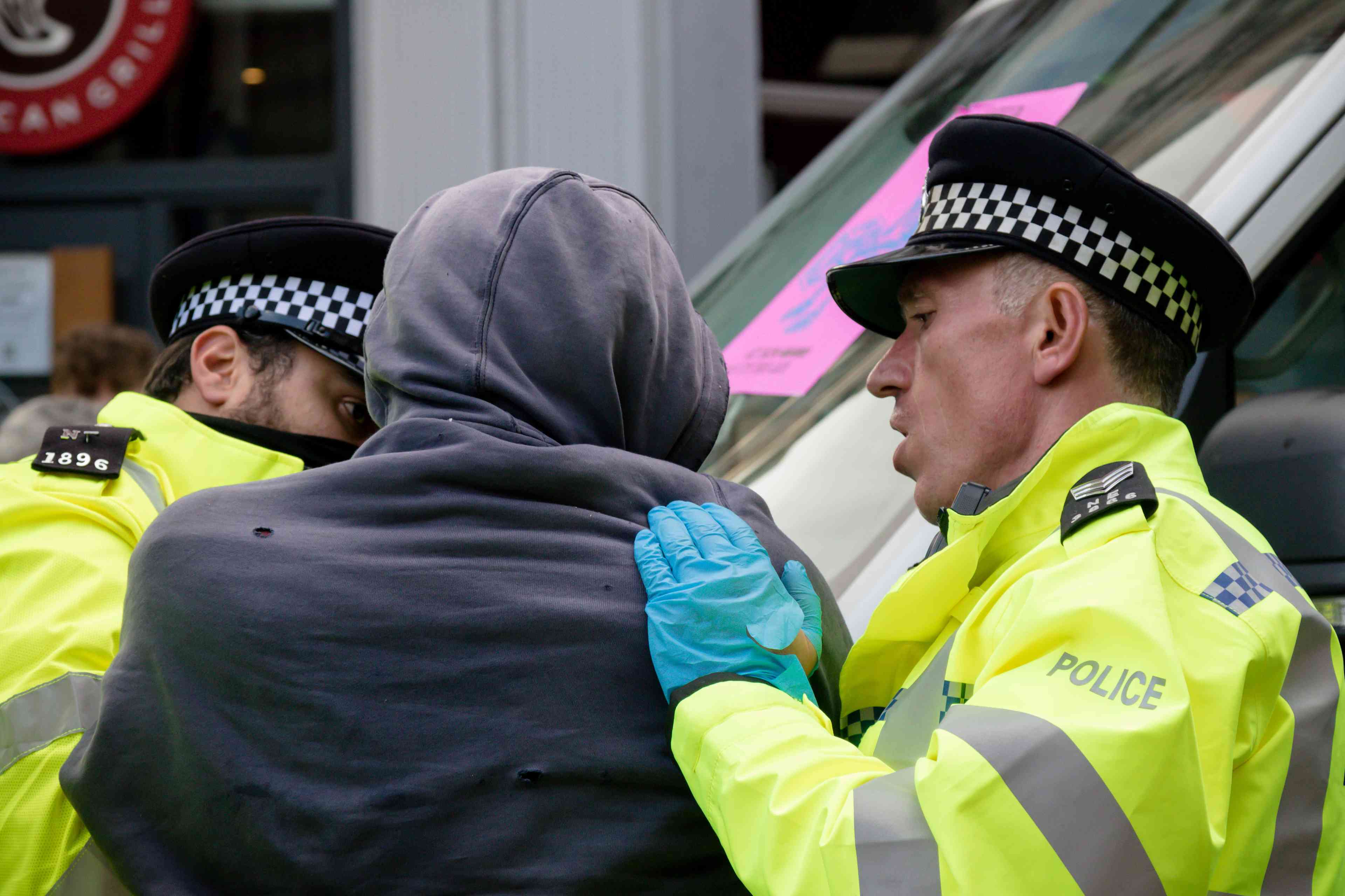 London police making arrest - archive background