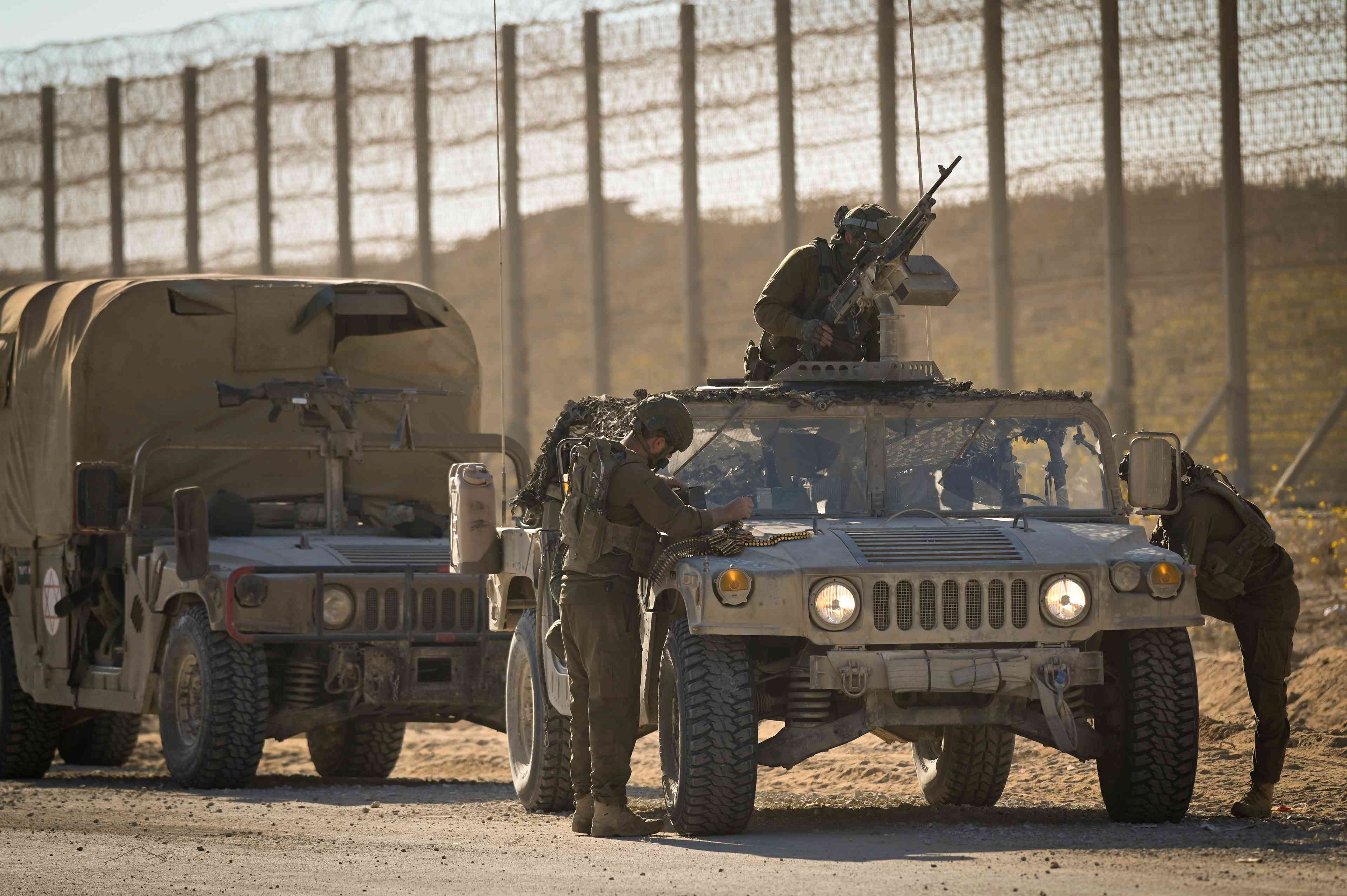 IDF soldiers and Merkava Tank in southern Israel, on the border with Gaza, November 11, 2024. background