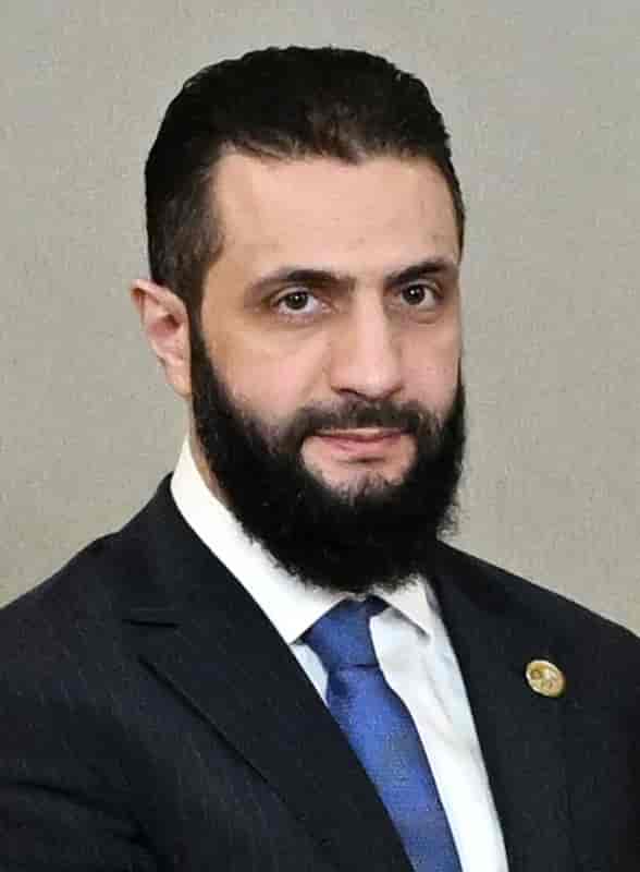 Syrian President al-Julani. background