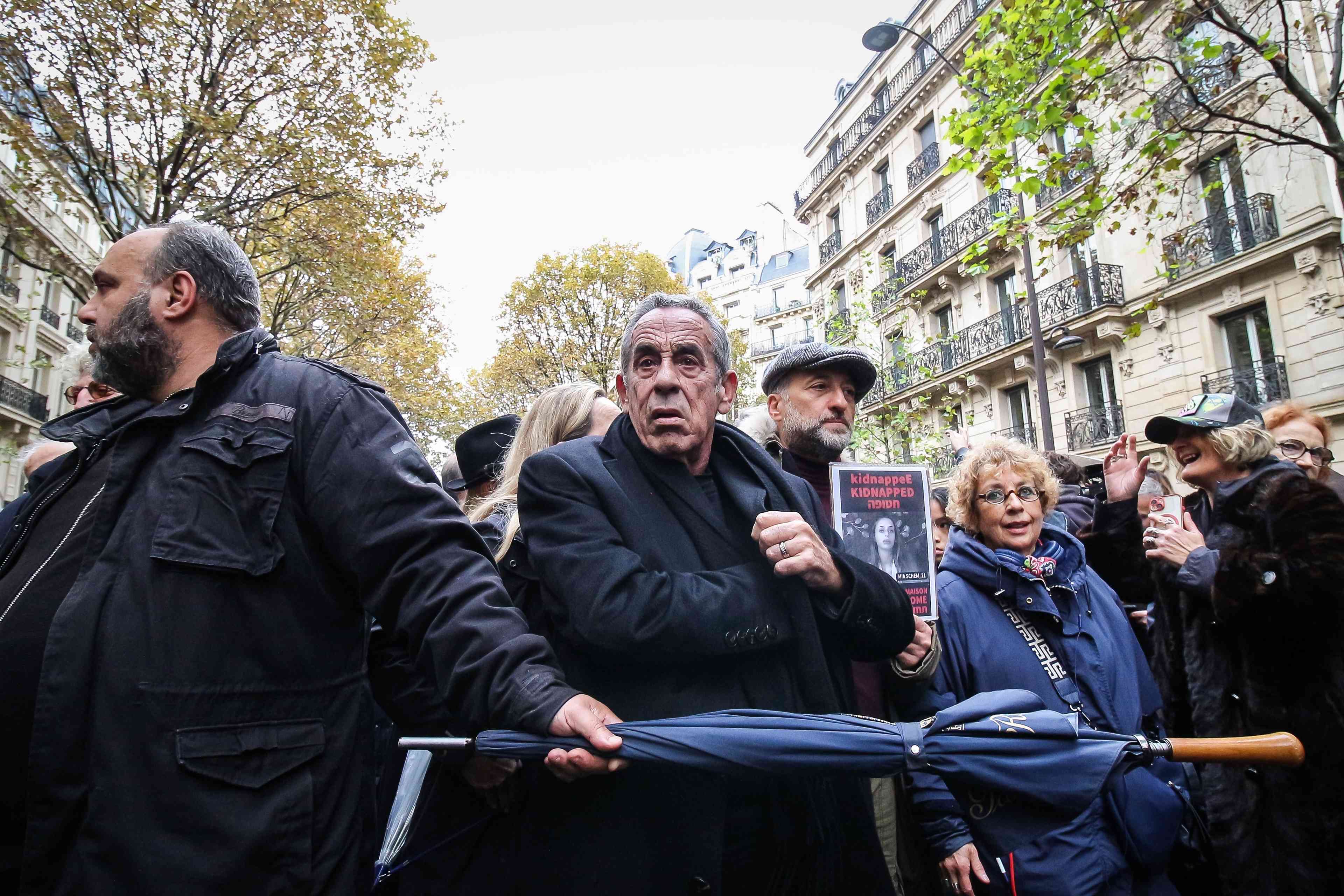 Thierry Ardisson at a march against anti-Semitism background