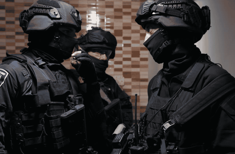 Arrest operations by Judea and Samaria District police officers. background