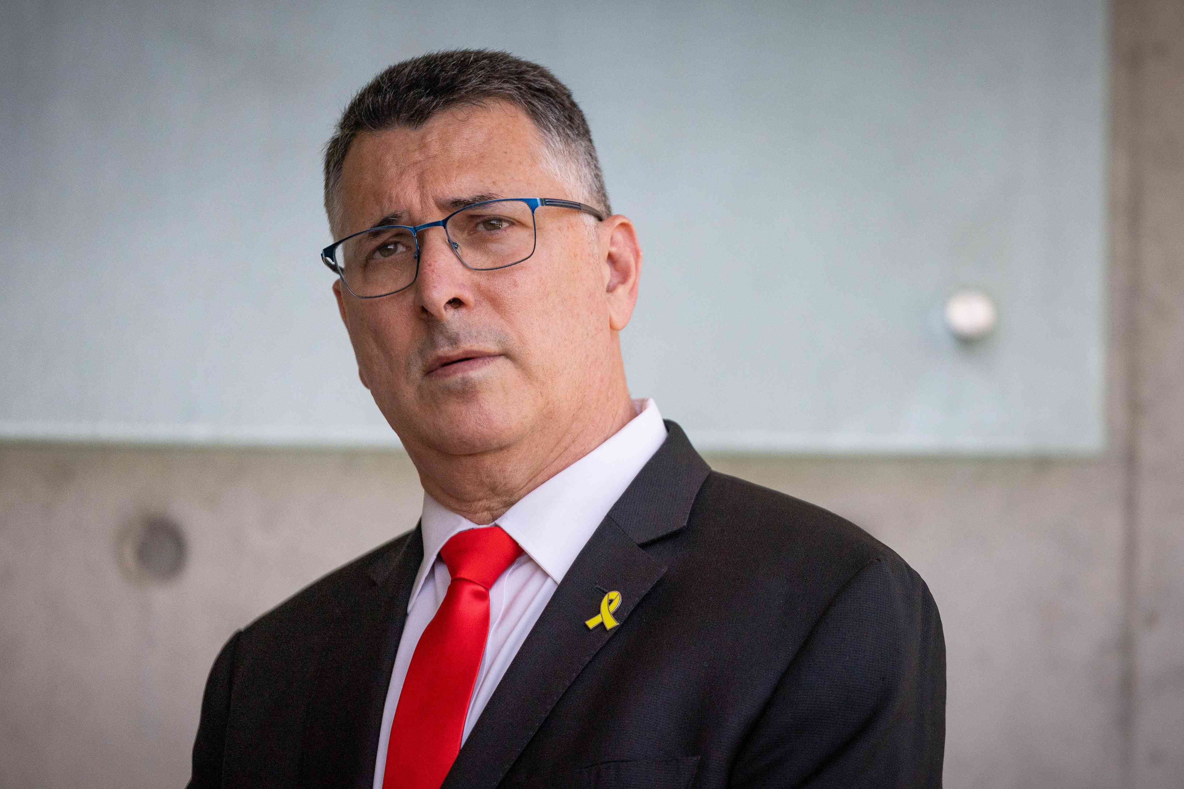 Foreign Minister Gideon Sa'ar. background