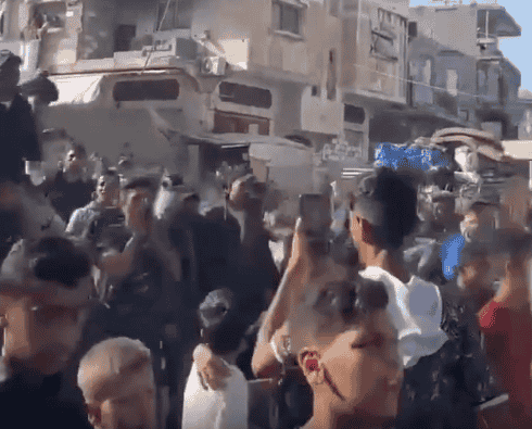 Palestinians protesting Hamas. background