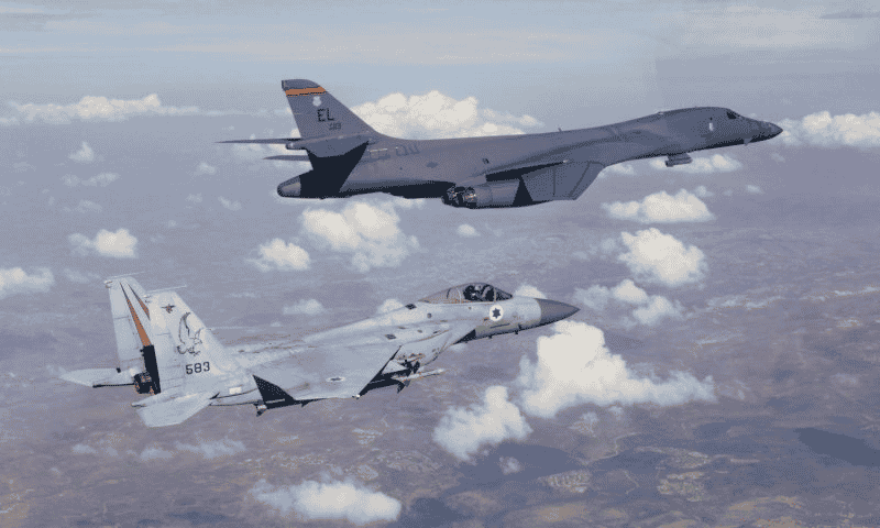 US bomber and Israeli jet background