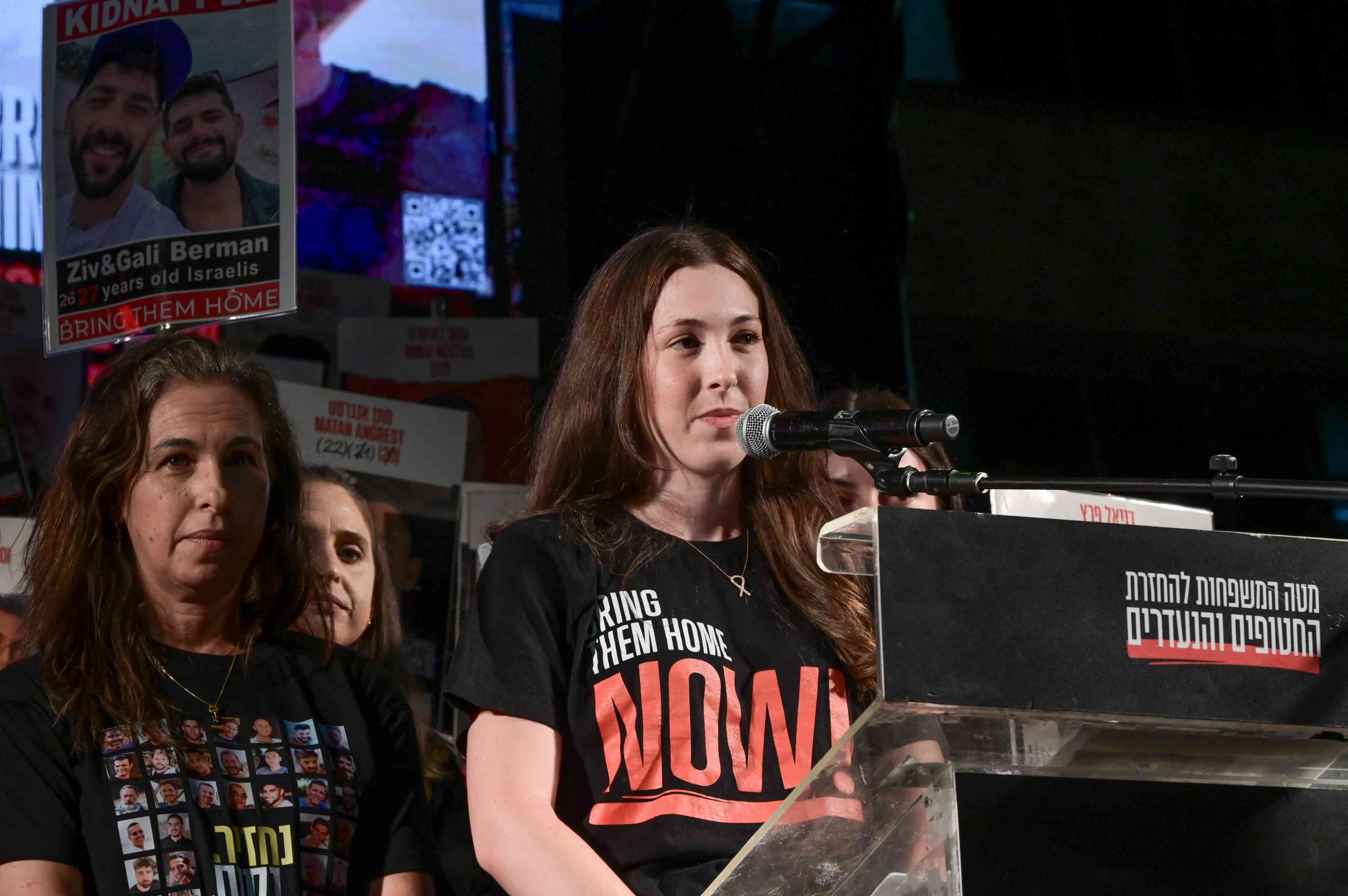 Former hostage Naama Levy speaks during a rally calling for the release of Israelis held hostage by Hamas terrorists in Gaza, at "Hostage Square" in Tel Aviv, May 24, 2025. background