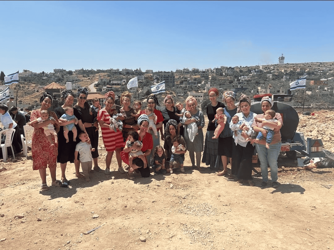 Women of Bruchin at place of new building in Bruchin South background